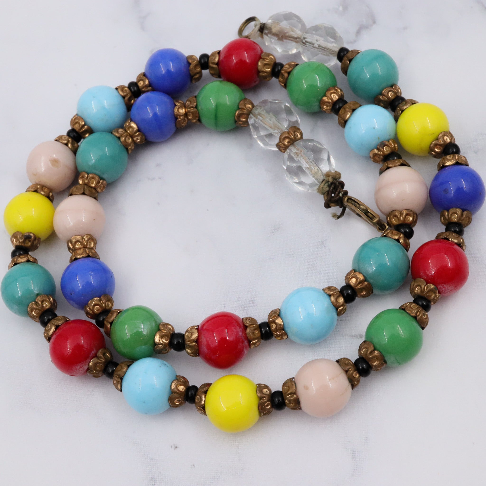 Antique rainbow glass beaded necklace with brass spacers, 16.5"